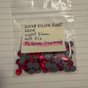 Swarovski • Color: Lt. Siam, 2028 XILION Rose Hotfix Rhinestones